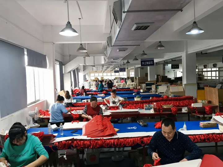 Factory workers at production line